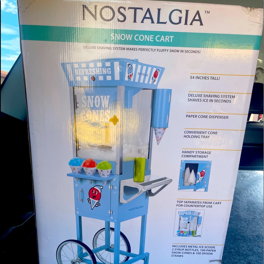 This full-sized snow cone cart will be the hit of every party!